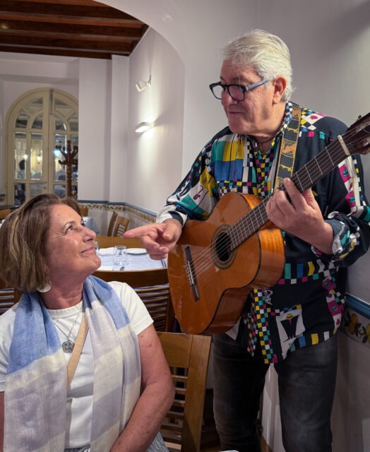 Nancy with one of the many singers of Neapolitan songs we met along the way.